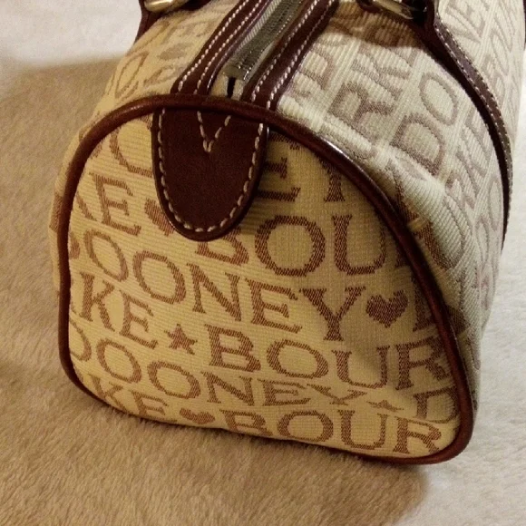 Dooney & Bourke Brown Logo Barrel Bag - Picture 2 of 16